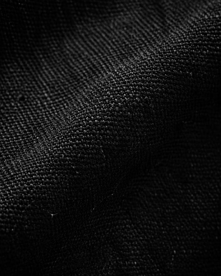Blurred close-up of dark fabric